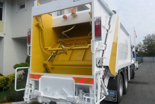 Garbage Compactor with Container Washing System