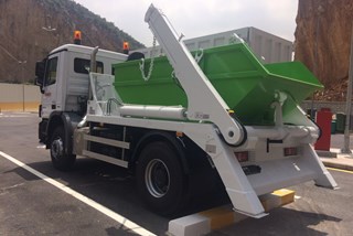 Skip Loader Truck